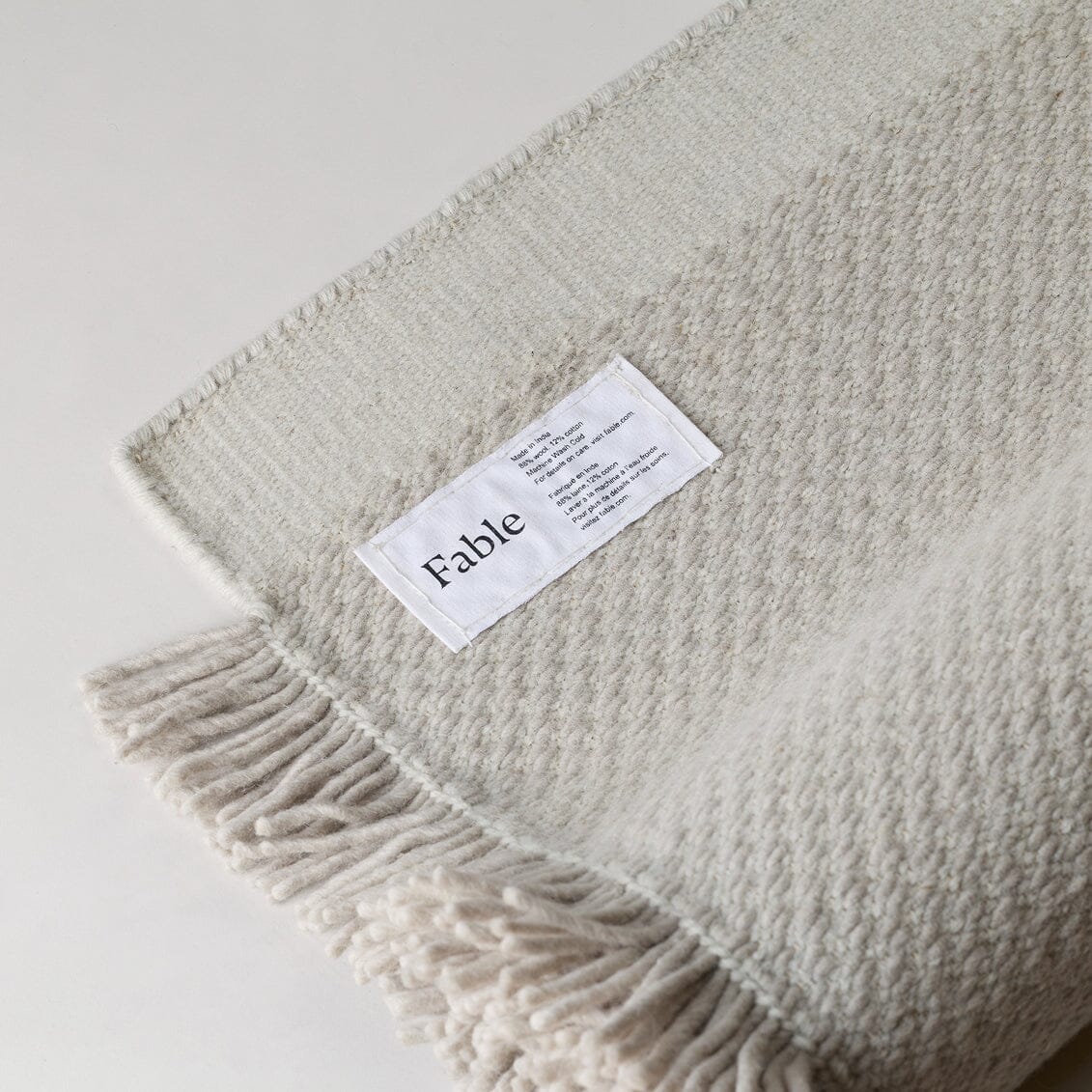 Textile product with 'Fable' label on a light background #foggray